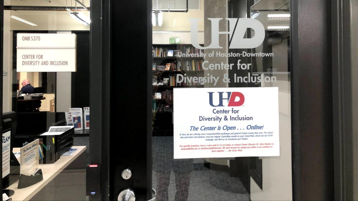 A poster on the front door of the Center for Diversity & Inclusion informs on the center's online availability in fall 2020 due to the COVID-19 pandemic's campus closure to students. 