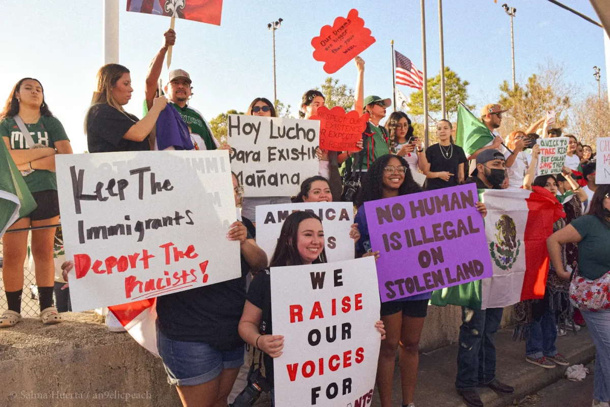 Houstonians protesting against Latino discrimination above Highway 59. Courtesy: Anastasia Olloque