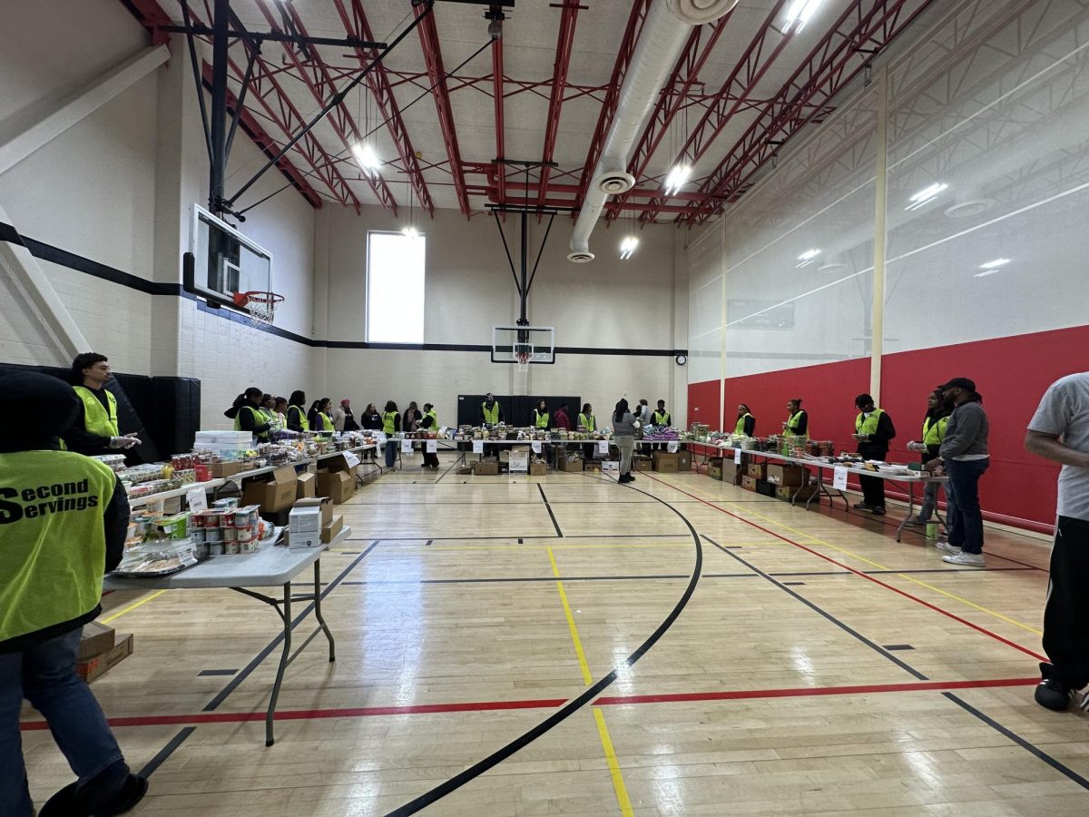 Volunteers prepare their goods to give to families.