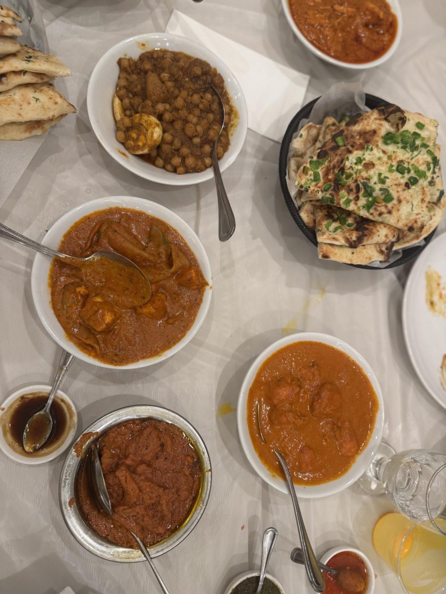 (Left to right) Choley Masala, Bullet Naan, Paneer Tikka Masala, Chicken Vindaloo, and Butter Chicken is also served at Aga's.