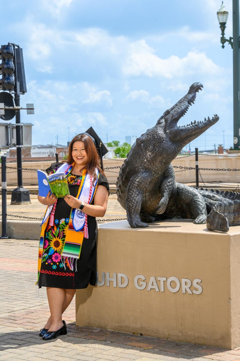 Carrillo holds the spring 2025 issue of The Bayou Review as she prepares for graduation. Courtesy: Karla Carrillo