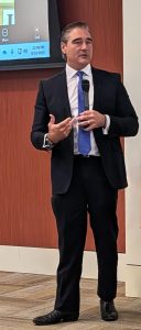 District Attorney Sean Teare speaking to the audience.